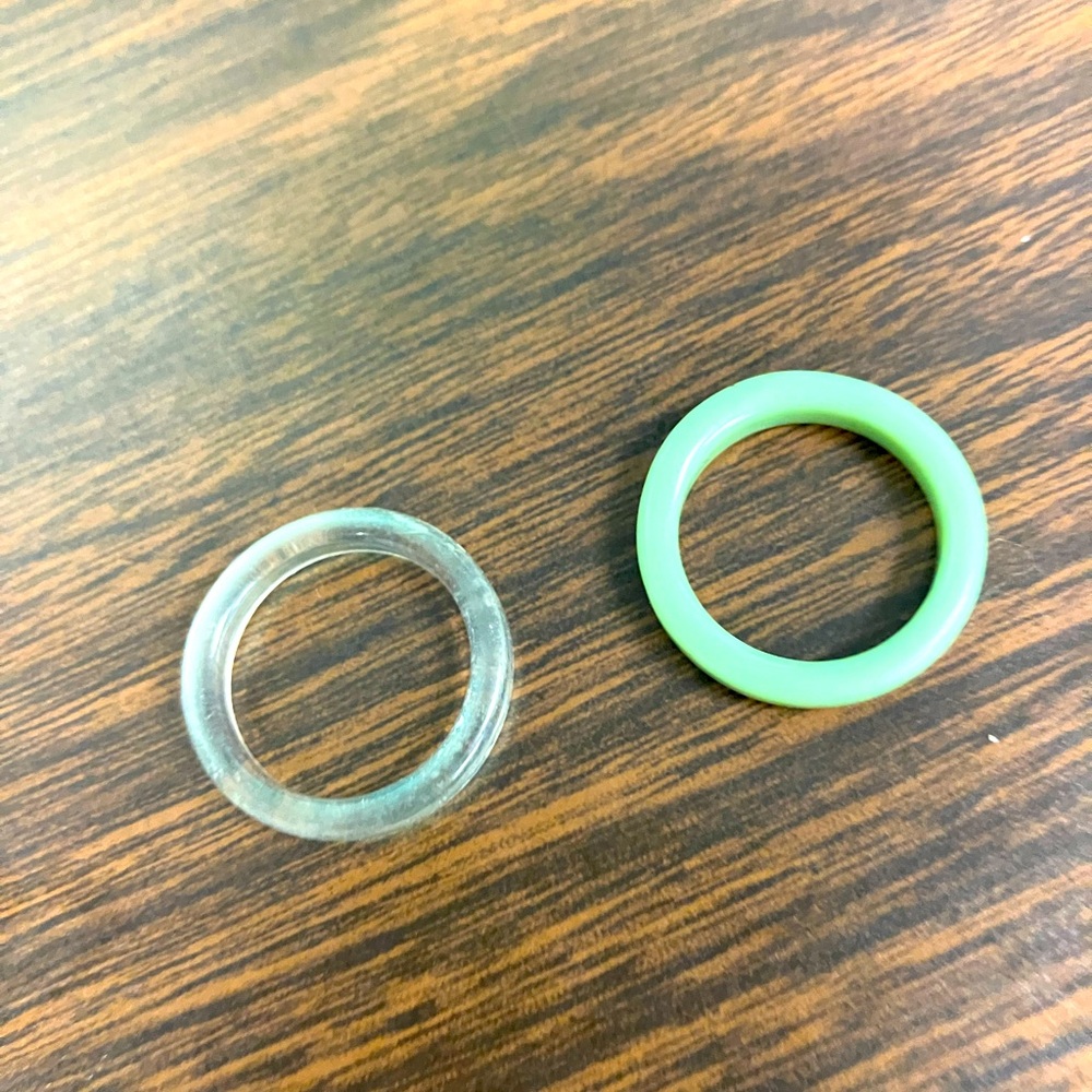 Clear and green plastic rings